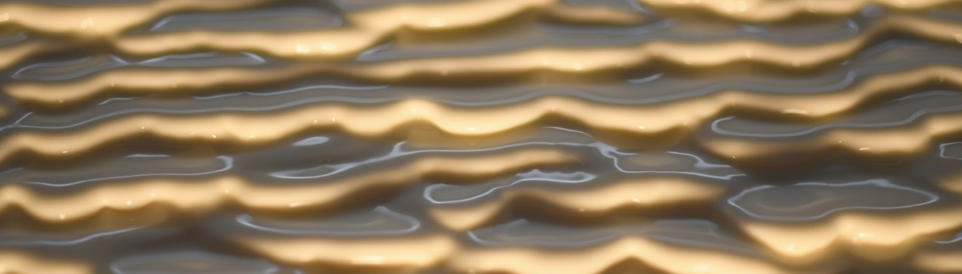 Apparition d’onde de surface lorsqu’une suspension de maïzena s’écoule sur un plan incliné. © Darbois et al.